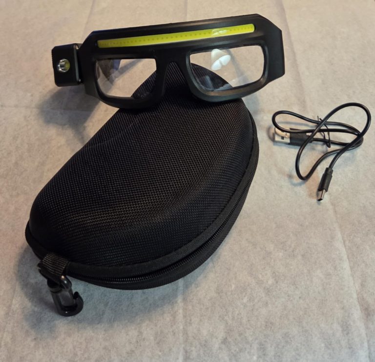 The LED eyeglasses come with a C-USB charging cable and a hard storage case with a clip for easy carrying. They feature a bright LED strip across the top and a focused side light, both with adjustable brightness. The side light can be tilted up or down, and the motion sensor allows hands-free on/off with a wave. A green indicator shows when the glasses are fully charged. Mr Ridwan Lagos ⭐⭐⭐⭐
